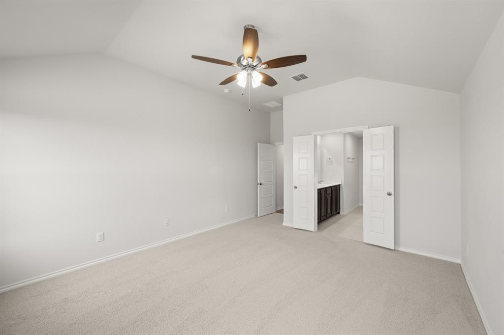 1908 Seminole Drive Cleburne, TX 76033 - Photo 19 of 27 an empty room with closet and windows