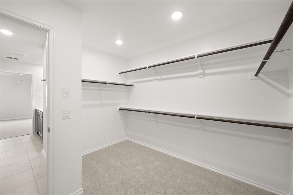 1908 Seminole Drive Cleburne, TX 76033 - Photo 21 of 27 a view of an empty walk in closet