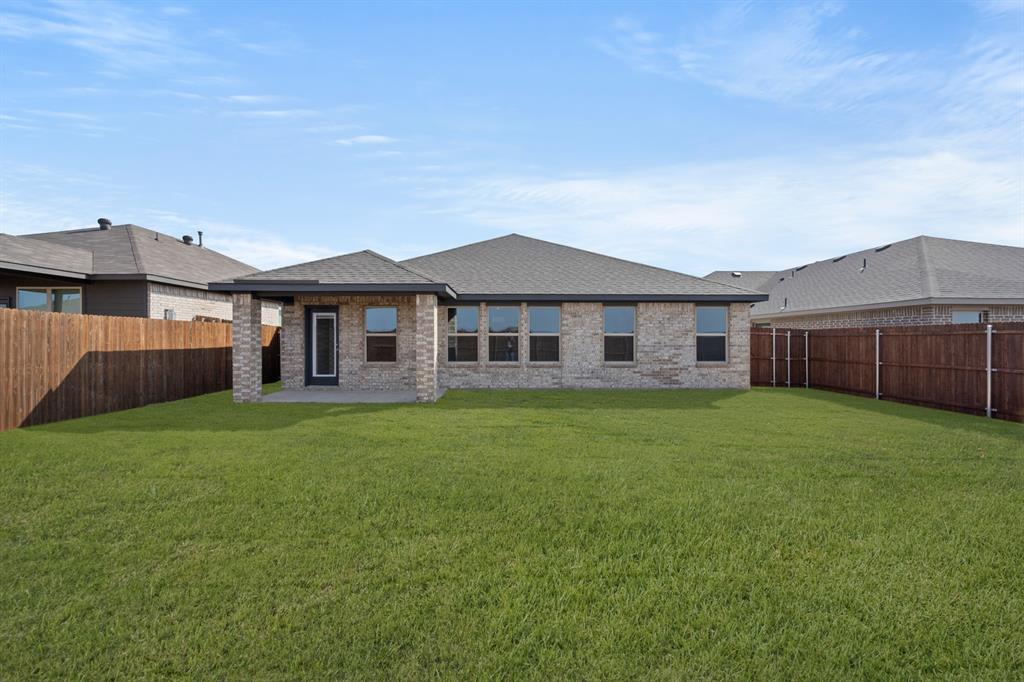 1908 Seminole Drive Cleburne, TX 76033 - Photo 25 of 27 a view of a house with a big yard