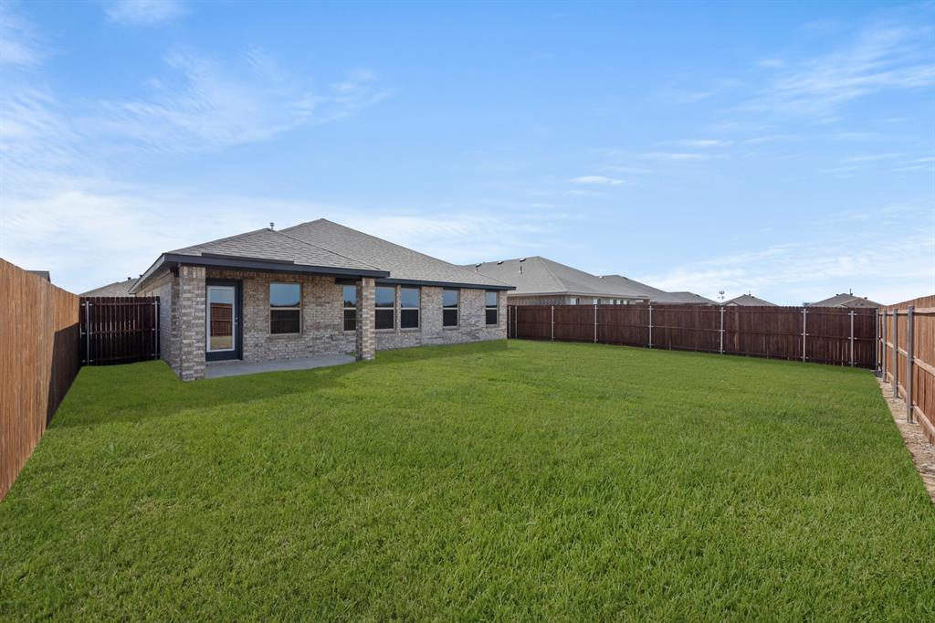 1908 Seminole Drive Cleburne, TX 76033 - Photo 26 of 27 a view of a house with a big yard