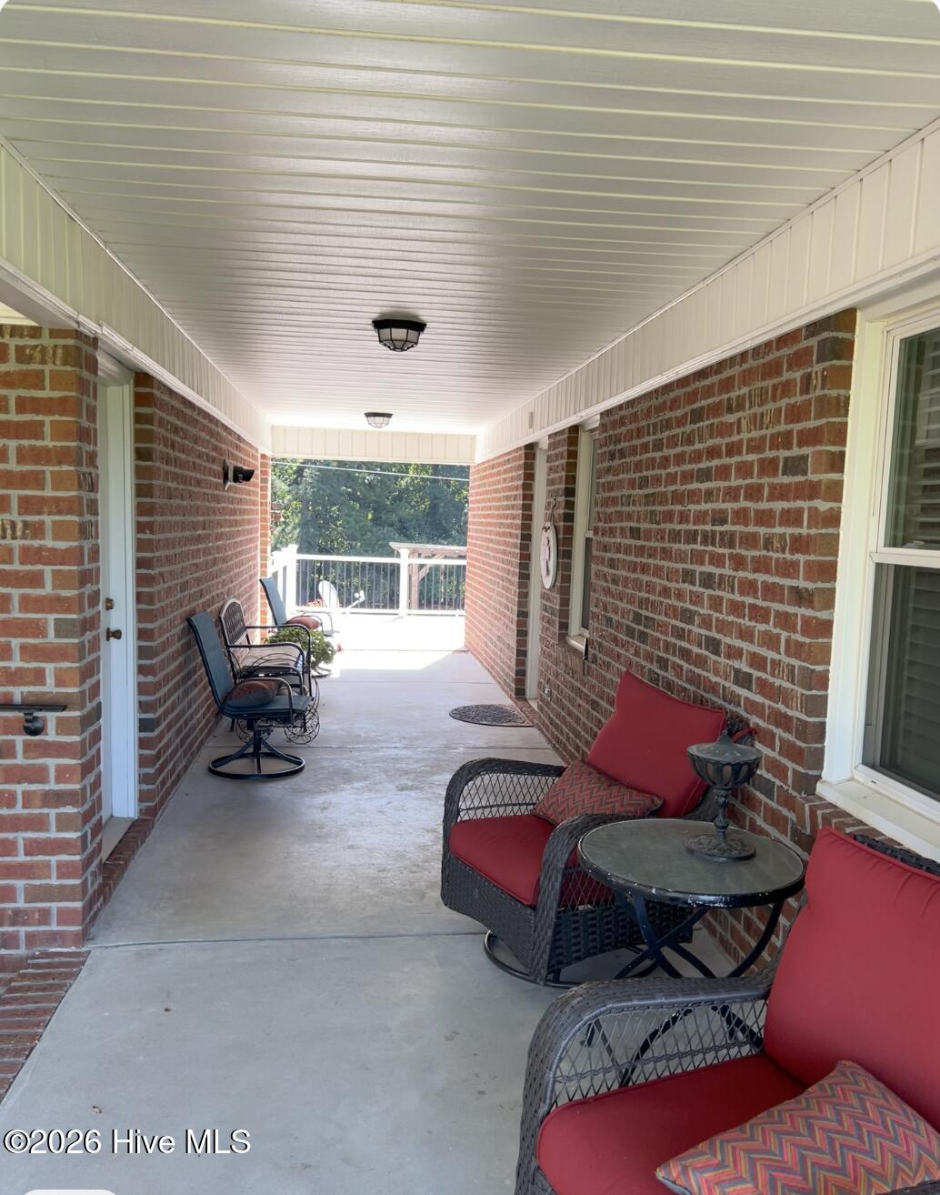 642 Enoch Road Clinton, NC 28328 - Photo 35 of 72 Breeze way between Garage and main house.