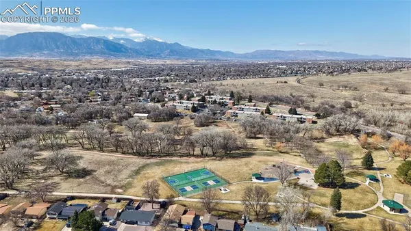 an aerial view of residential house with outdoor space