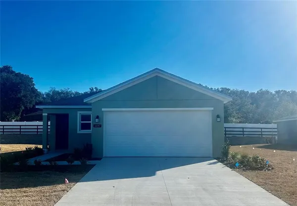 a view of backyard of house