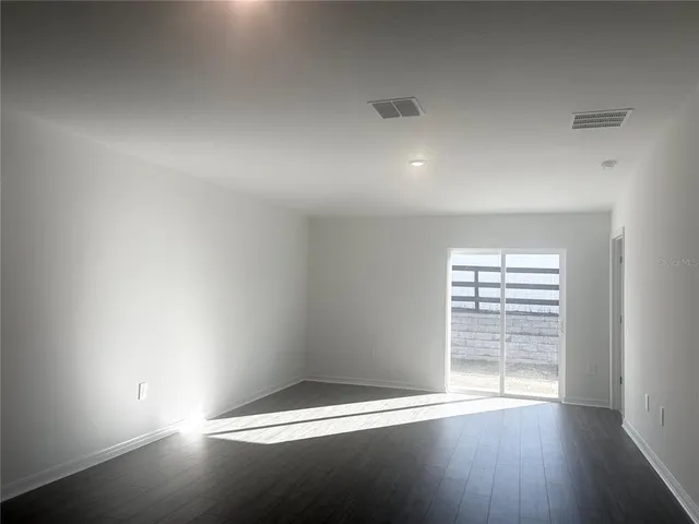 a bathroom with a bath tub and a toilet
