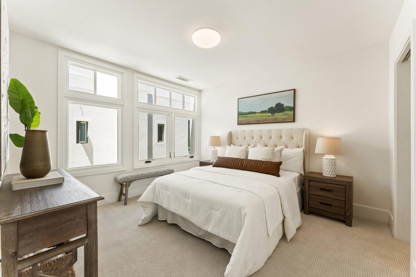 533 Fierro Loop Campbell, CA 95008 - Photo 37 of 62 a bedroom with a bed a table and painting