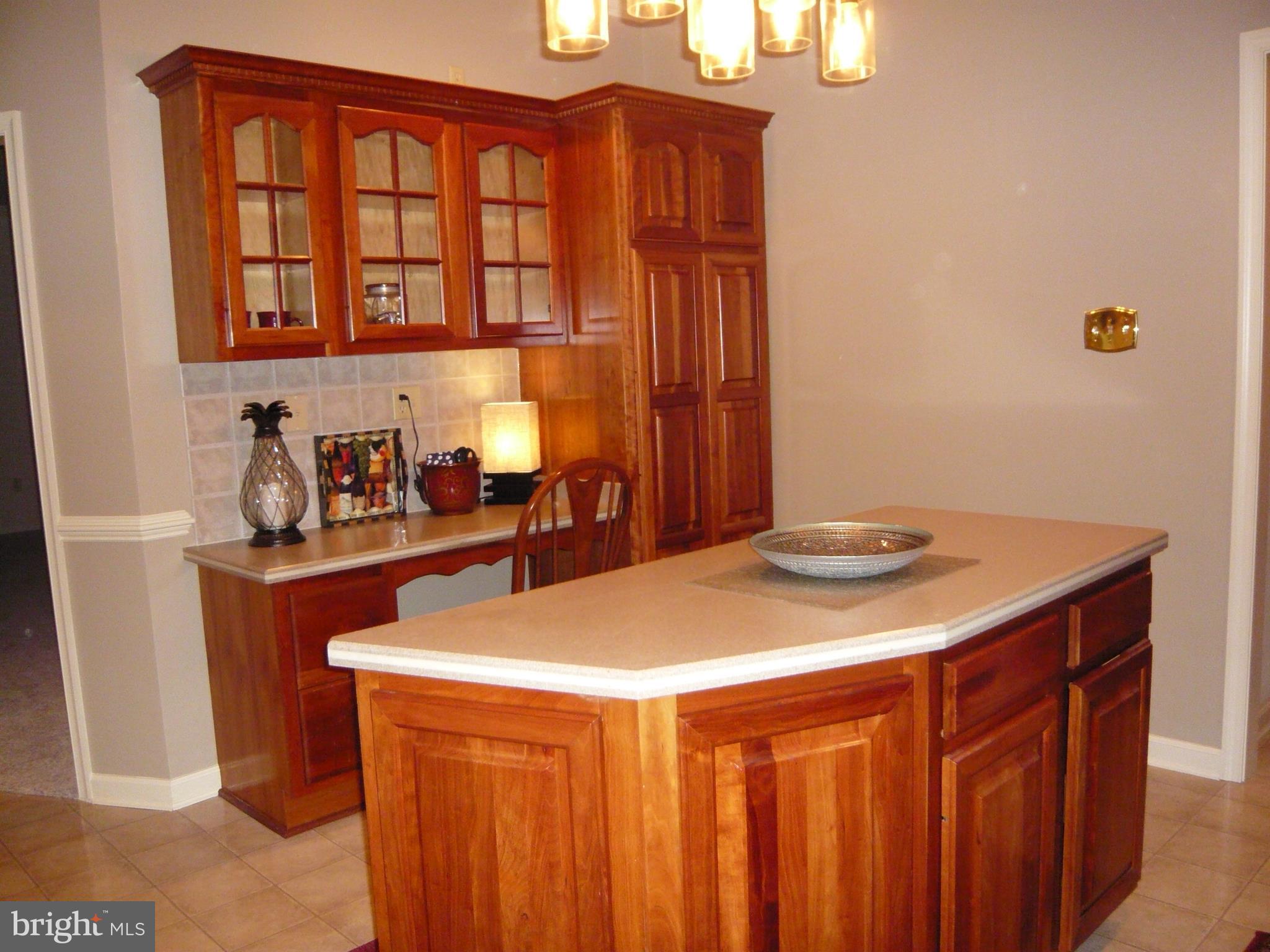 6815 Arvey Road Parsonsburg, MD 21849 - Photo 9 of 27 Kitchen Island and desk