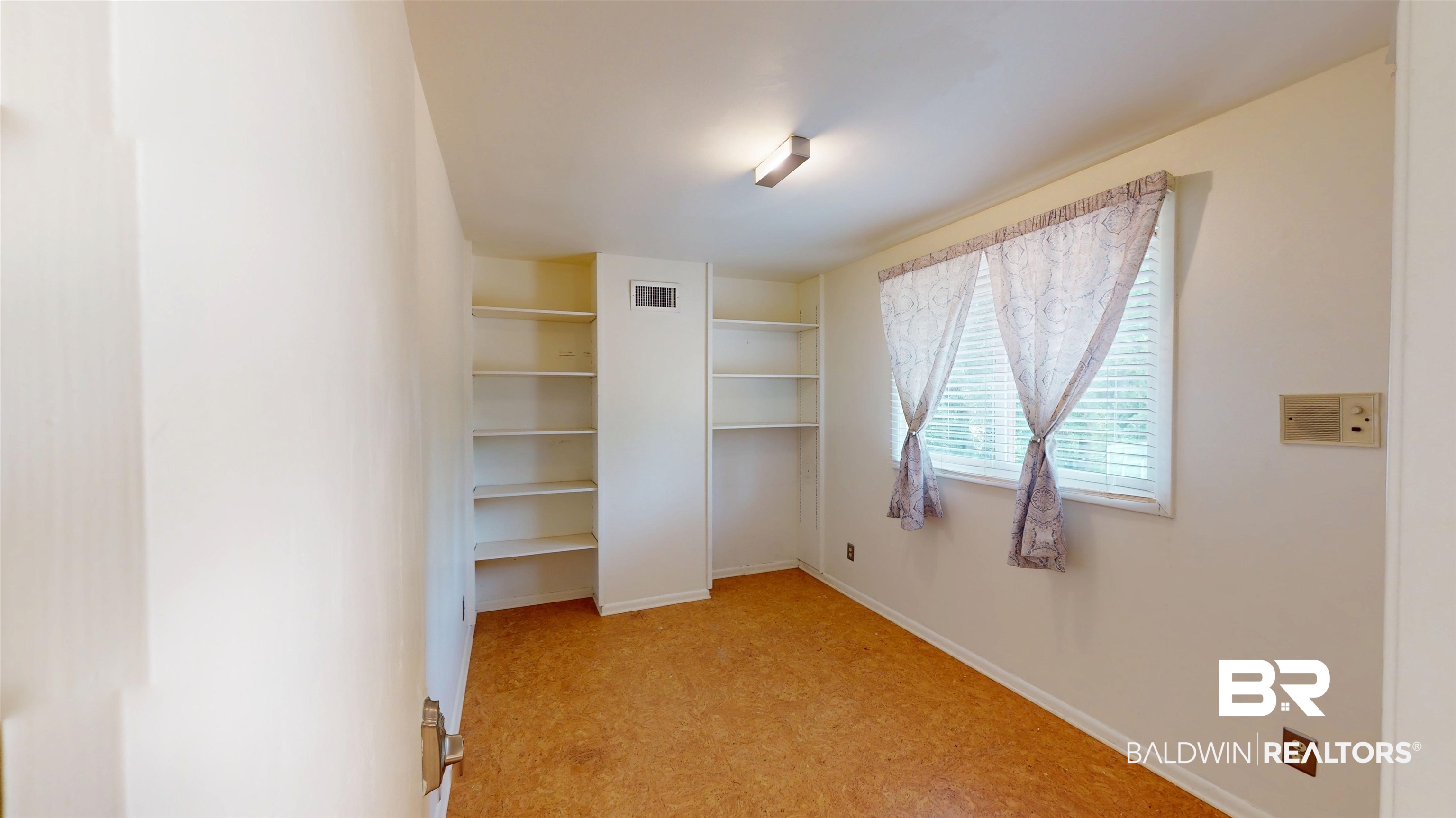 15 Spring Bank Road Mobile, AL 36608 - Photo 51 of 58 Unfurnished bedroom featuring baseboards