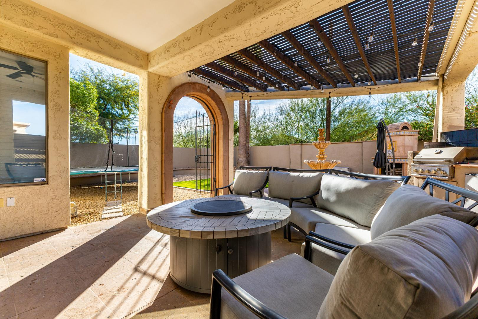 2707 West Lamar Road Phoenix, AZ 85017 - Photo 24 of 44 a outdoor living space with furniture and a garden