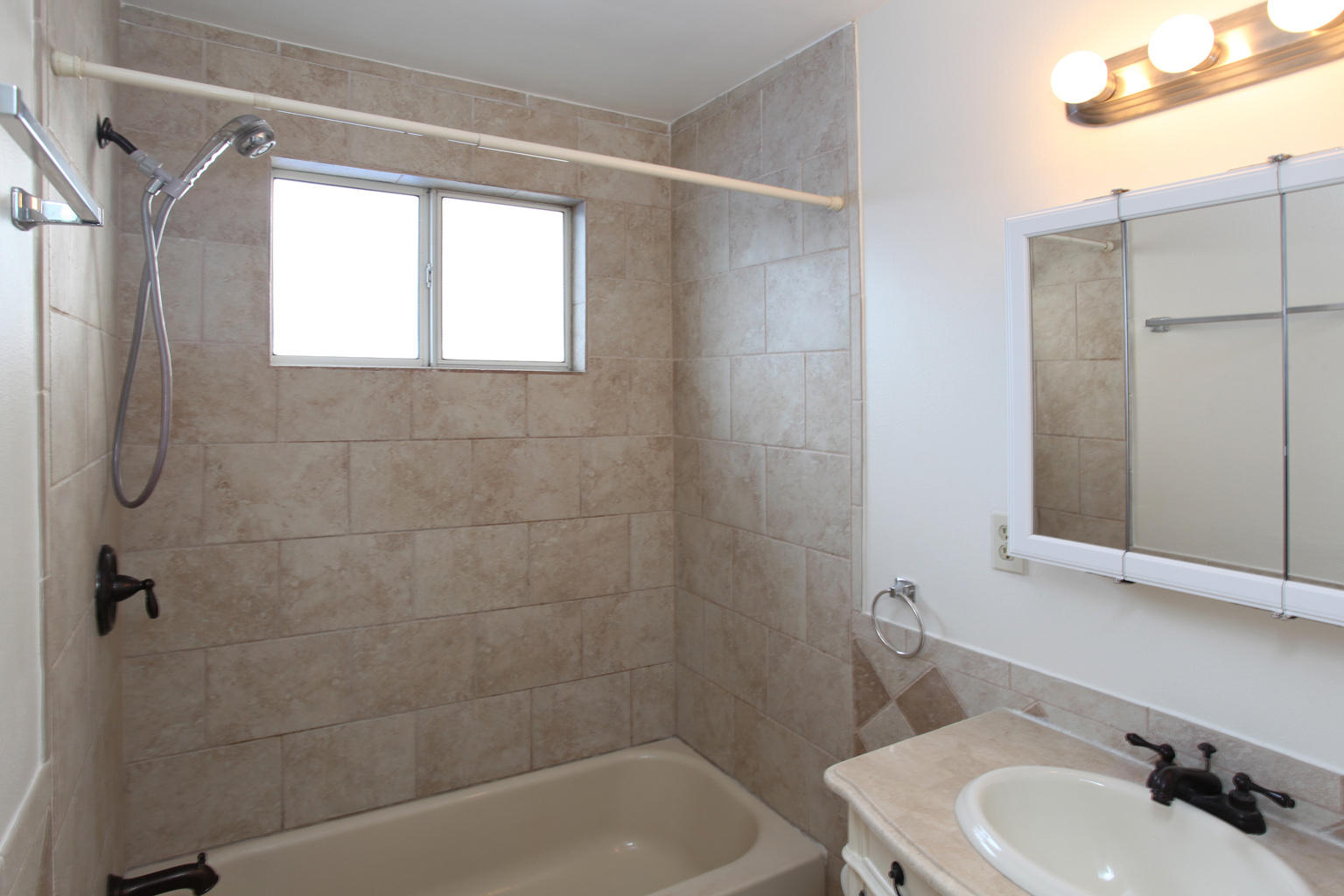 1035 Cramer Road, Unit B Carpinteria, CA 93013 - Photo 11 of 12 a bathroom with a sink and a bathtub