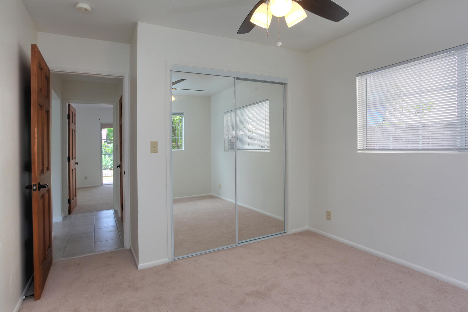 1035 Cramer Road, Unit B Carpinteria, CA 93013 - Photo 10 of 12 wooden floor in an empty room with a mirror