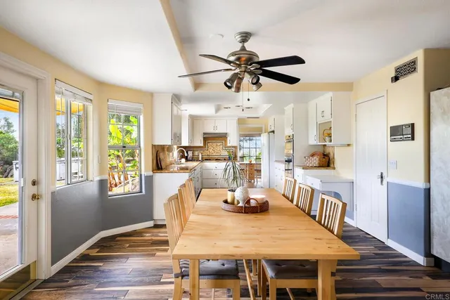 a kitchen with a stove and cabinets