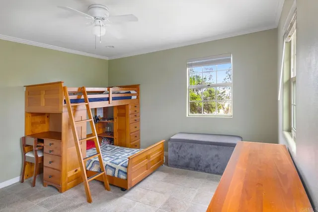 a bathroom with a granite countertop sink a mirror and a bathtub