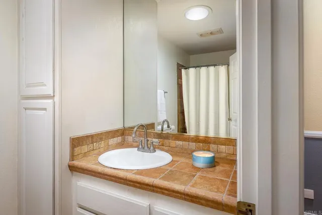 a view of a car park in front of house