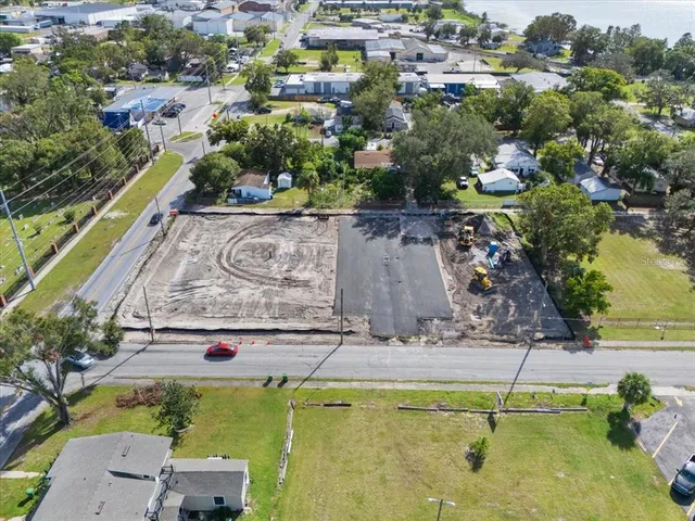 an aerial view of a house with a garden