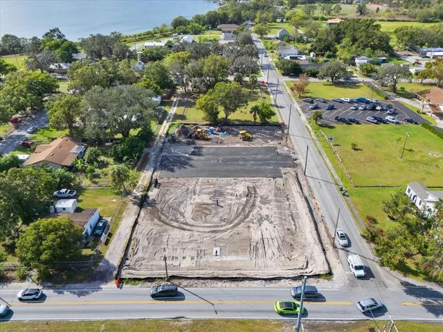 an aerial view of a house with a swimming pool