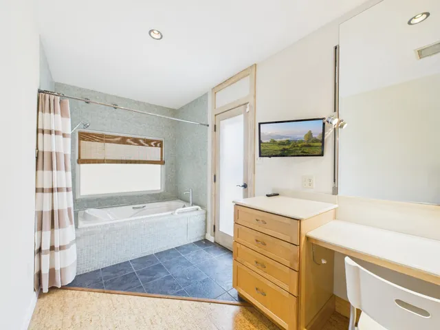 a view of bathroom with dual sinks