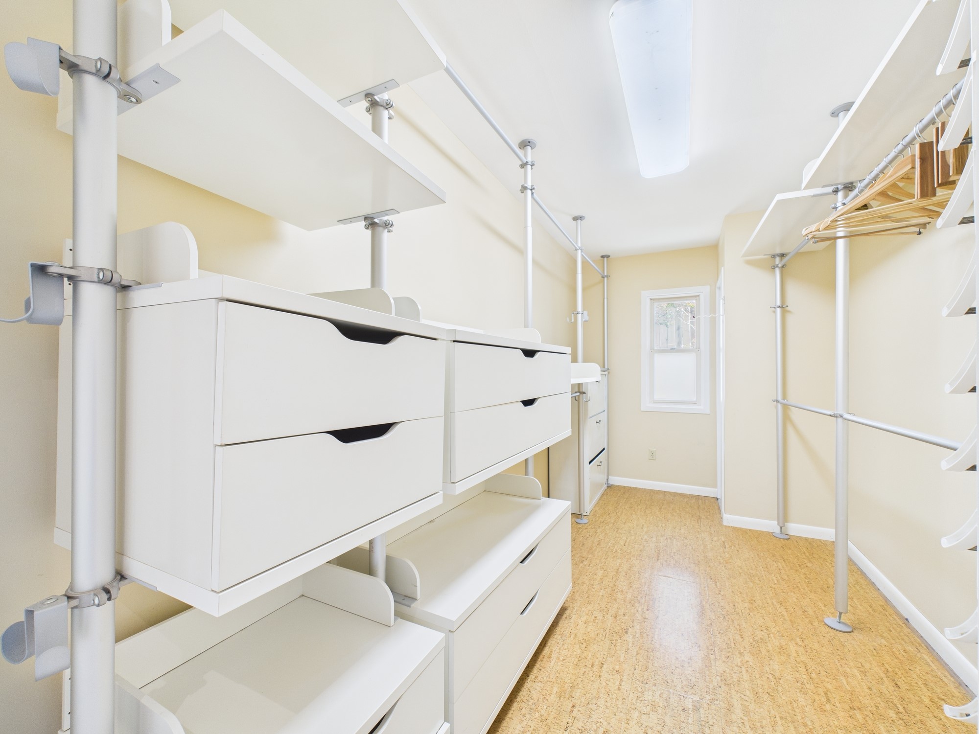 2432 Chimney Rock Road Houston, TX 77057 - Photo 37 of 43 a view of hallway with stairs and a chandelier