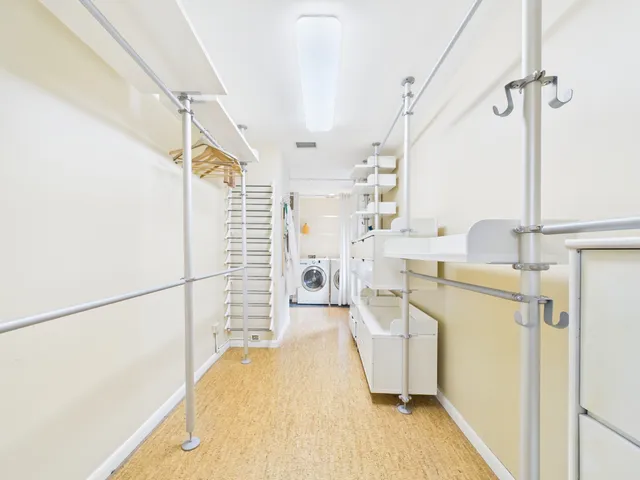 a bathroom with a sink a mirror and a shower