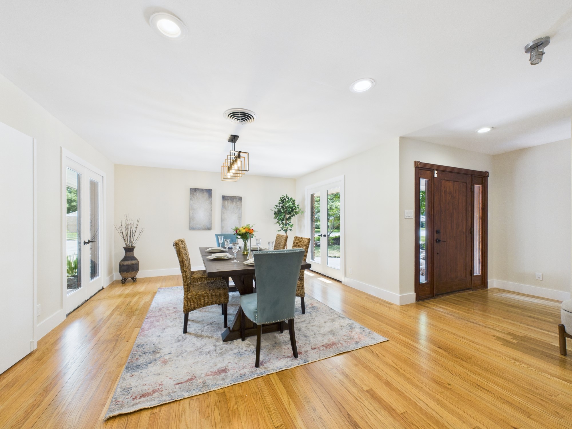 2432 Chimney Rock Road Houston, TX 77057 - Photo 3 of 43 a view of a dining room with furniture window and wooden floor