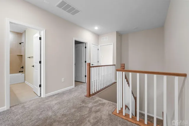 a view of a hallway with entryway