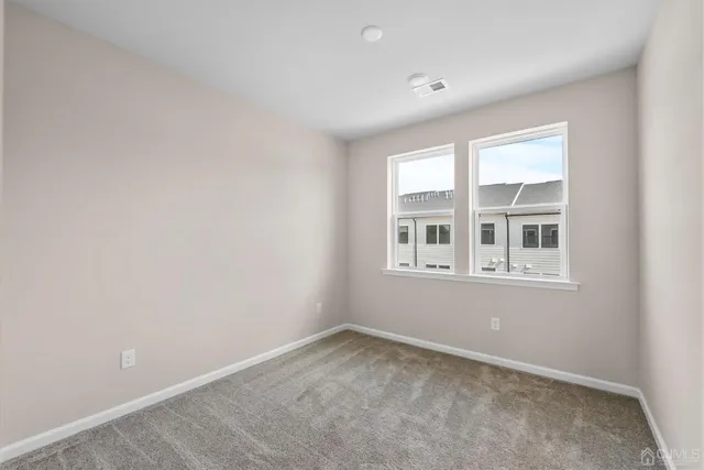 a front view of a building with windows