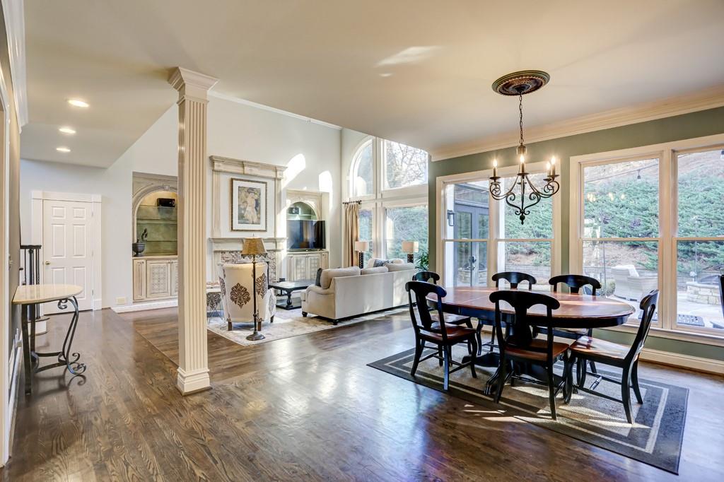 5940 Whitestone Lane Suwanee, GA 30024 - Photo 21 of 63 a view of a dining room with furniture window and wooden floor