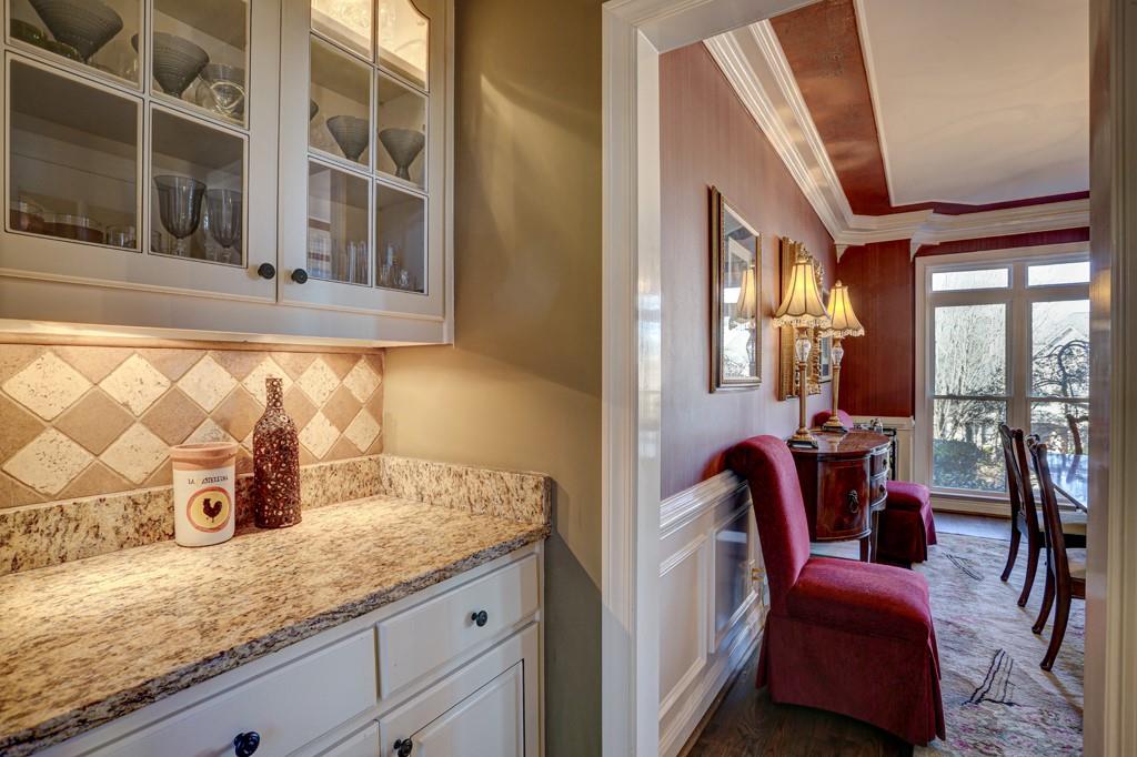 5940 Whitestone Lane Suwanee, GA 30024 - Photo 24 of 63 view of living room with furniture and floor to ceiling window