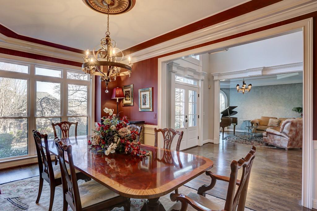5940 Whitestone Lane Suwanee, GA 30024 - Photo 27 of 63 a view of a dining room with furniture window and outside view