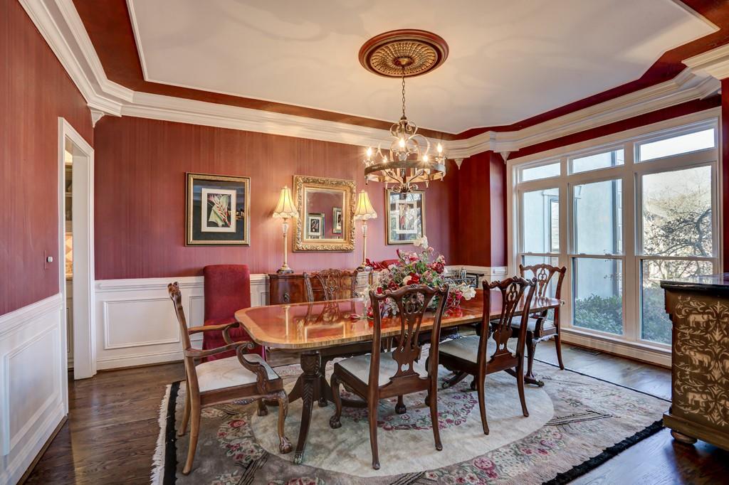 5940 Whitestone Lane Suwanee, GA 30024 - Photo 28 of 63 a view of a dining room with furniture window and wooden floor