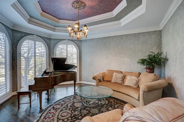 a view of a patio with couches and a fire pit
