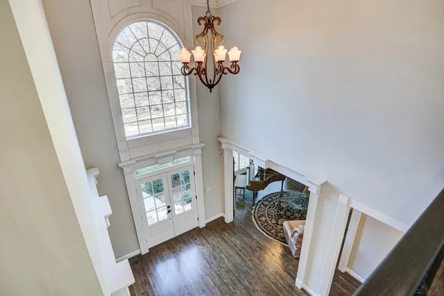 a living room with furniture fireplace and a flat screen tv