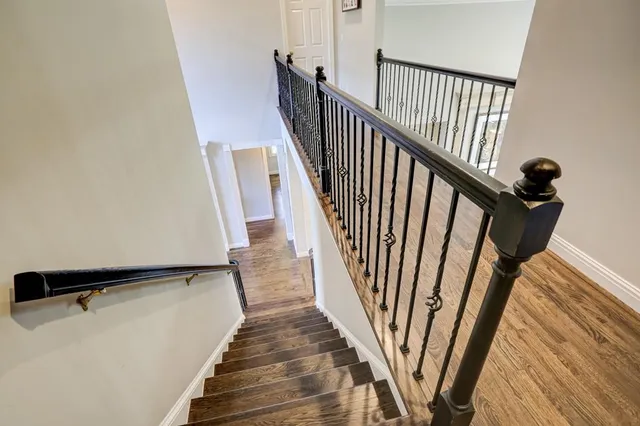 a living room with furniture fireplace and flat screen tv