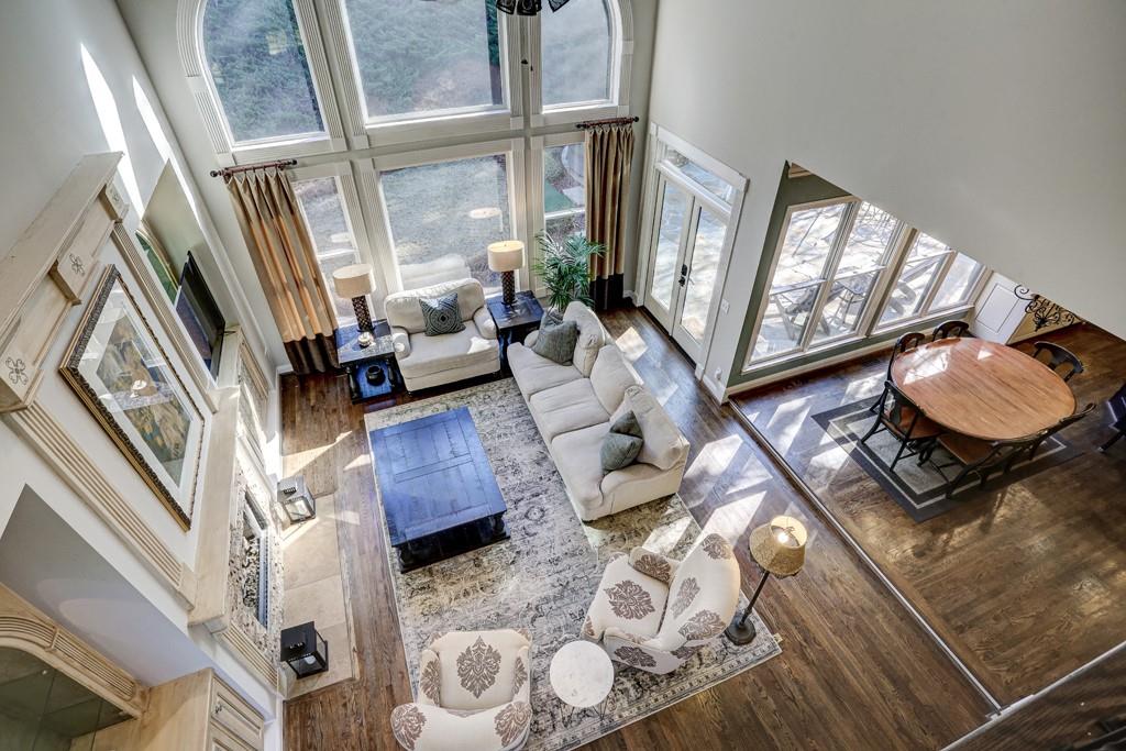 5940 Whitestone Lane Suwanee, GA 30024 - Photo 39 of 63 a living room with furniture and a large window