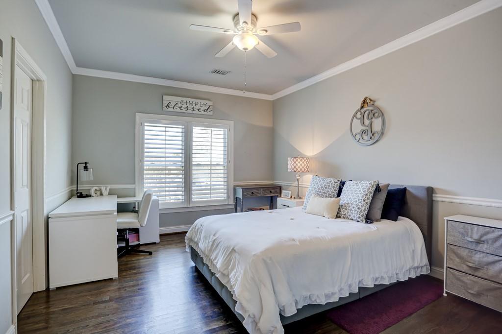 5940 Whitestone Lane Suwanee, GA 30024 - Photo 49 of 63 a bedroom with a bed and window