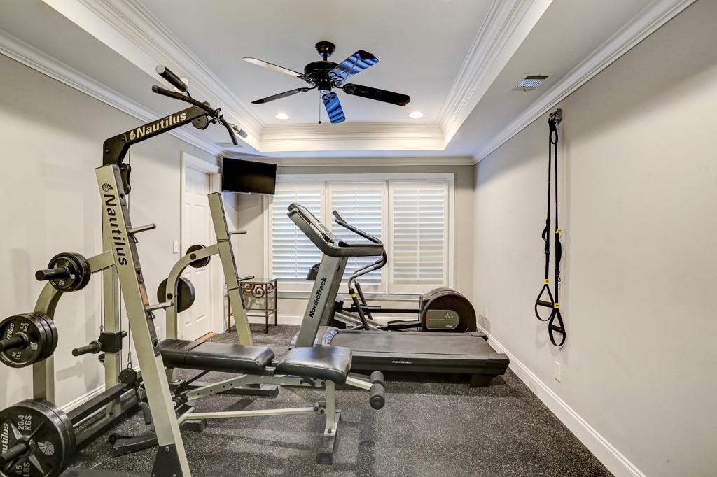 5940 Whitestone Lane Suwanee, GA 30024 - Photo 60 of 63 a view of a room with gym equipment