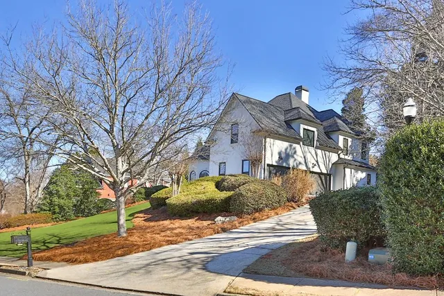 a view of entryway with wooden floor and stairs