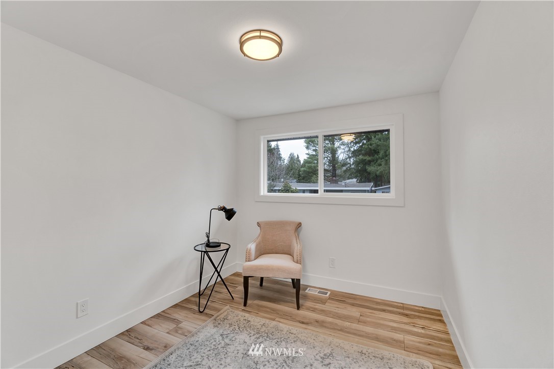 4606 237th Place Southwest Mountlake Terrace, WA 98043 - Photo 20 of 40 a living room with furniture and a window