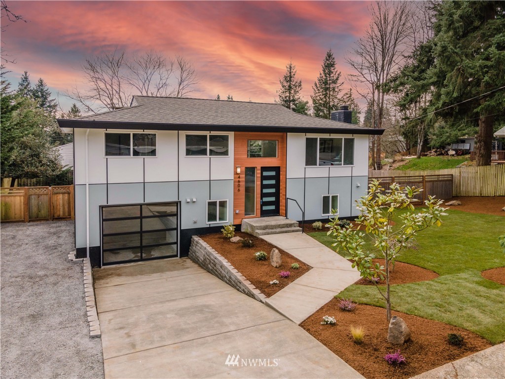 4606 237th Place Southwest Mountlake Terrace, WA 98043 - Photo 2 of 40 a front view of a house with garden