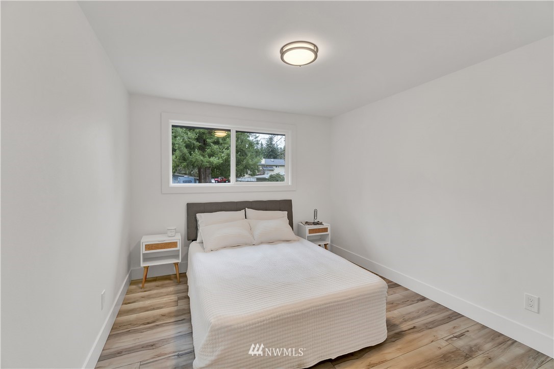 4606 237th Place Southwest Mountlake Terrace, WA 98043 - Photo 21 of 40 a bedroom with a bed and window