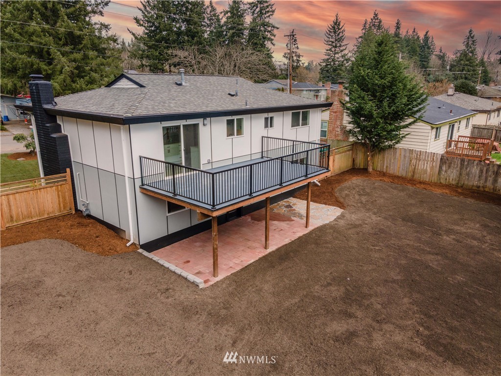 4606 237th Place Southwest Mountlake Terrace, WA 98043 - Photo 33 of 40 aerial view of a house with a yard and sitting area