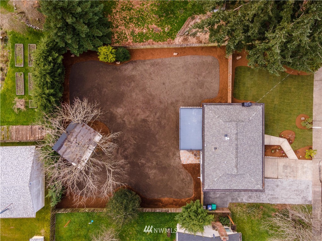 4606 237th Place Southwest Mountlake Terrace, WA 98043 - Photo 39 of 40 an aerial view of a house with a yard