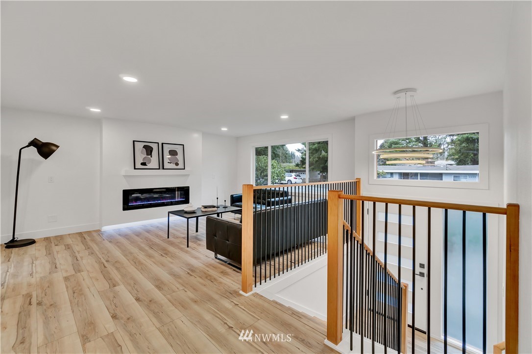 4606 237th Place Southwest Mountlake Terrace, WA 98043 - Photo 7 of 40 a living room with furniture and a flat screen tv
