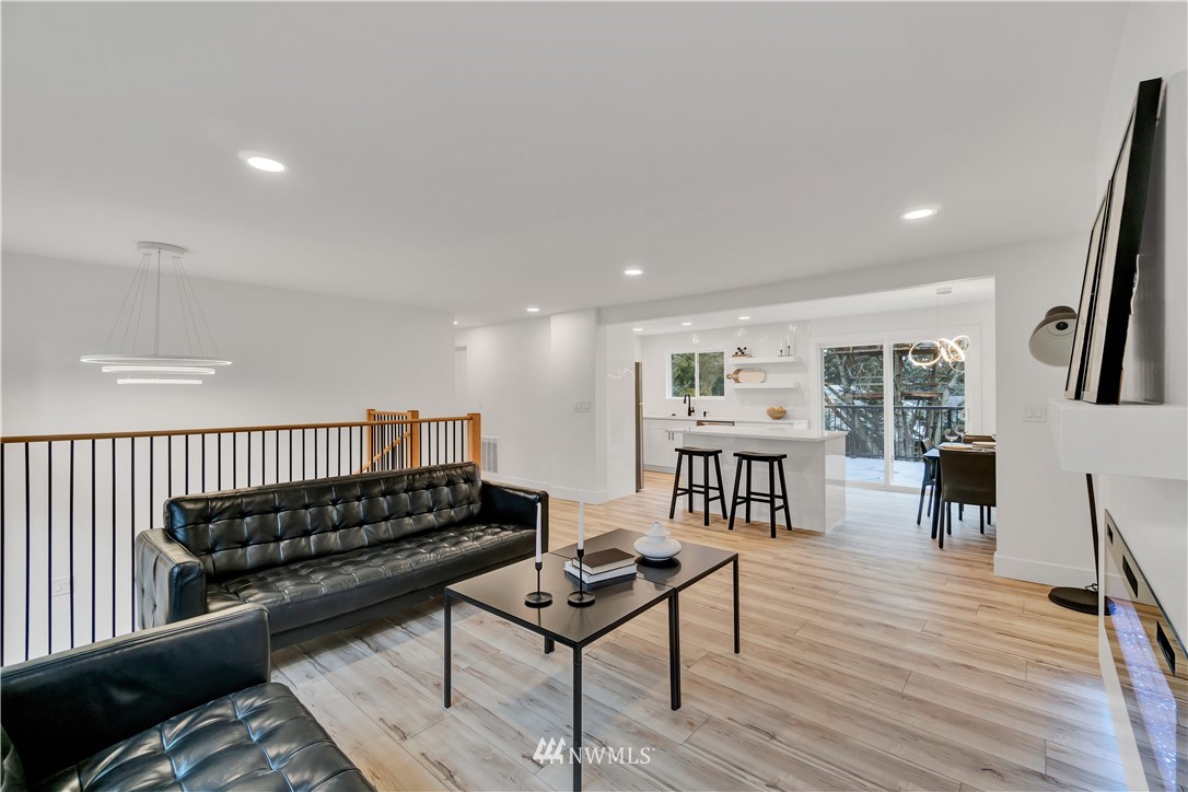 4606 237th Place Southwest Mountlake Terrace, WA 98043 - Photo 10 of 40 a living room with furniture and wooden floor