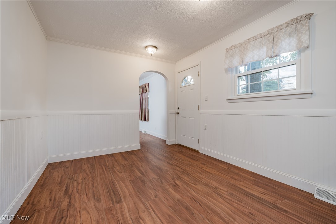 6342 Melody Road Northeast Canton, OH 44721 - Photo 8 of 20 2 great spots for your kitchen table, arched doorway to living room