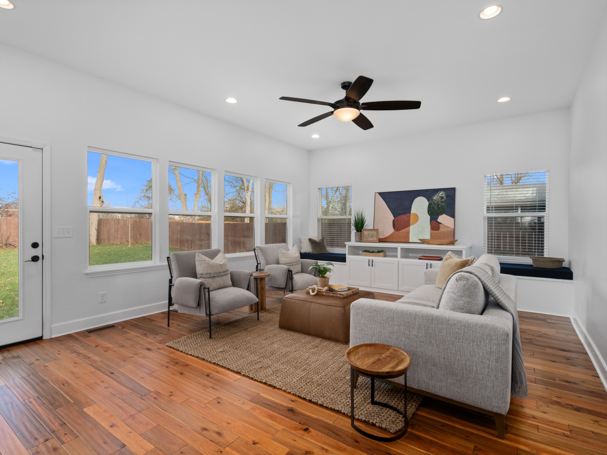 1121 Winding Way Road Nashville, TN 37216 - Photo 16 of 44 Oversized Family Room overlooks the backyard and includes even more storage space with the entertainment cabinet and cushioned window seats.