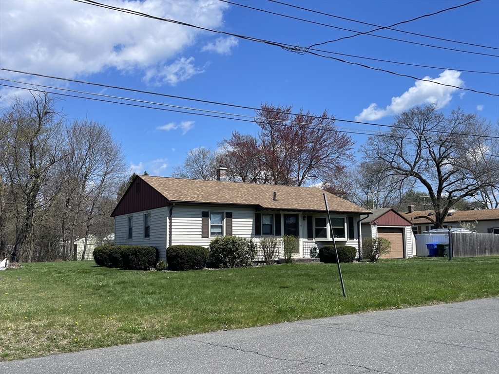 16 Gary Road Springfield, MA 01119 - Photo 3 of 22 a front view of a house with a yard