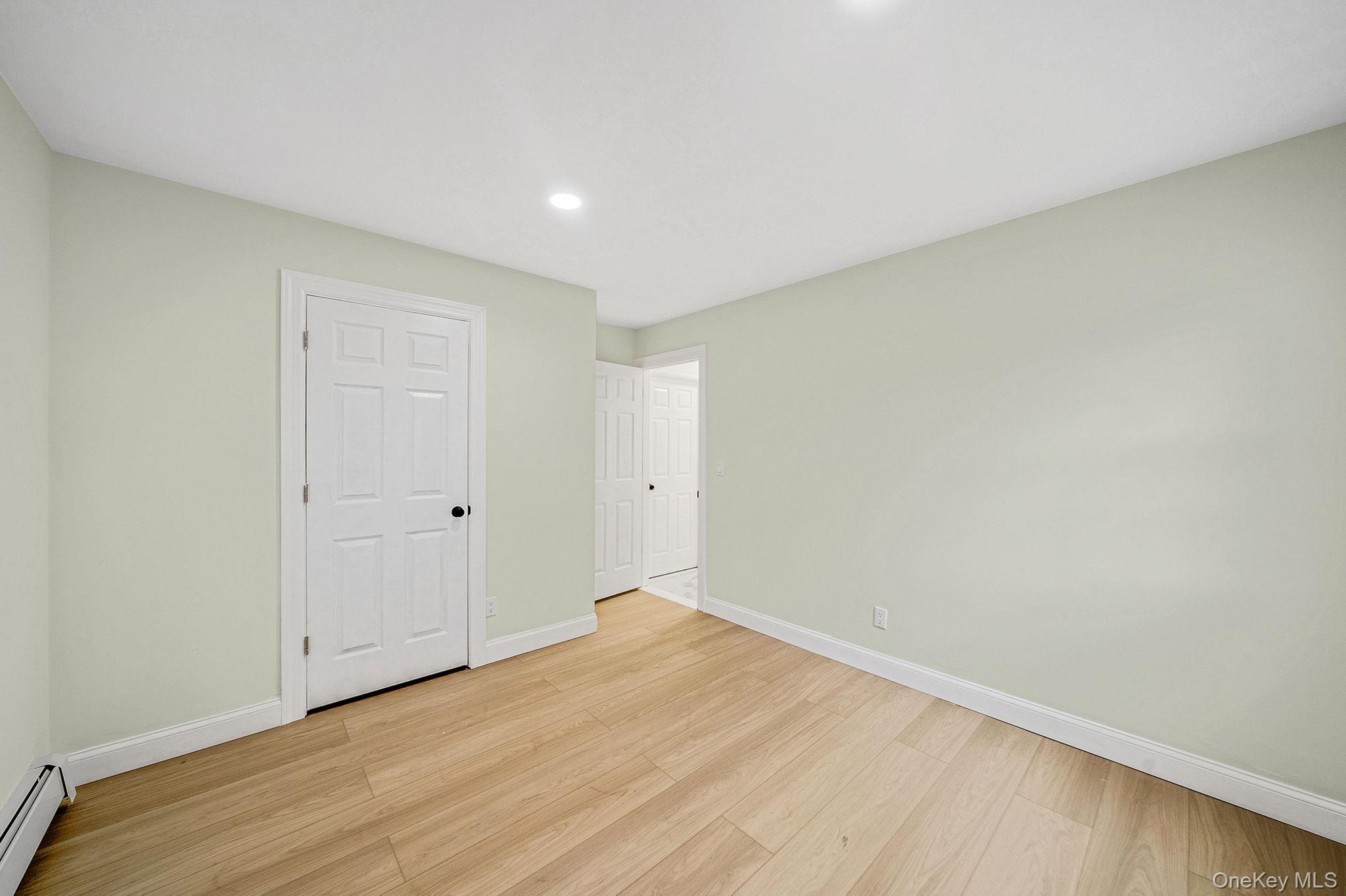 50 7th Street St. James, NY 11780 - Photo 18 of 25 a view of an empty room