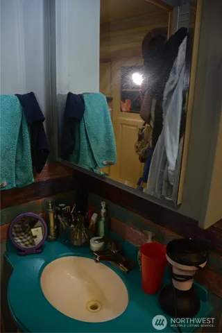 a kitchen with stainless steel appliances cabinets and a counter top space