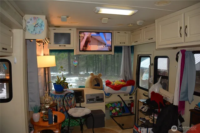 a outdoor living space with furniture and a fireplace