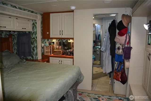 a bed room with a bed and a closet